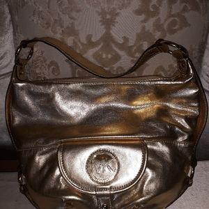 Michael Kors gold leather purse new with tags